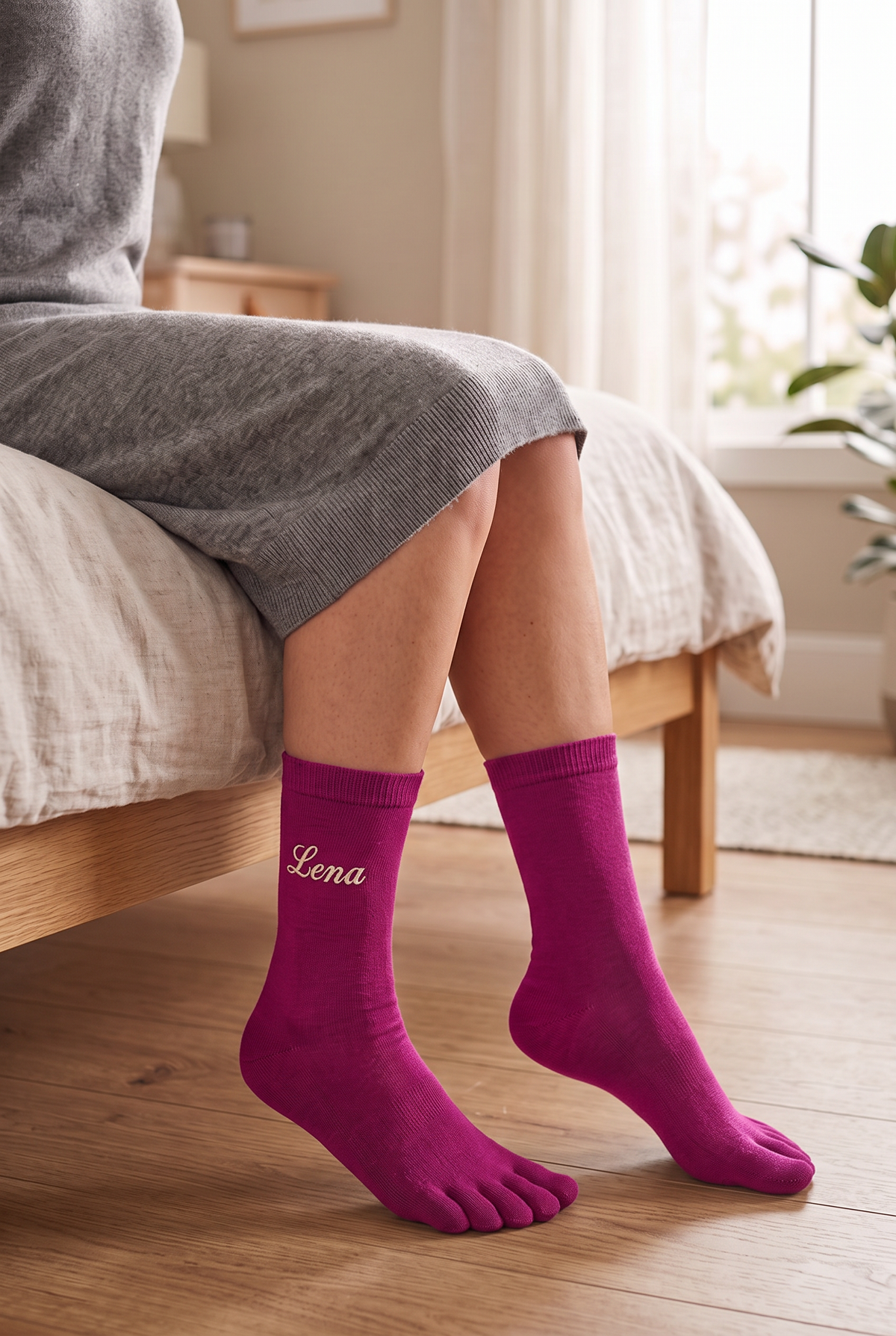 Model wearing fuchsia embroidered toe socks, seen from the side