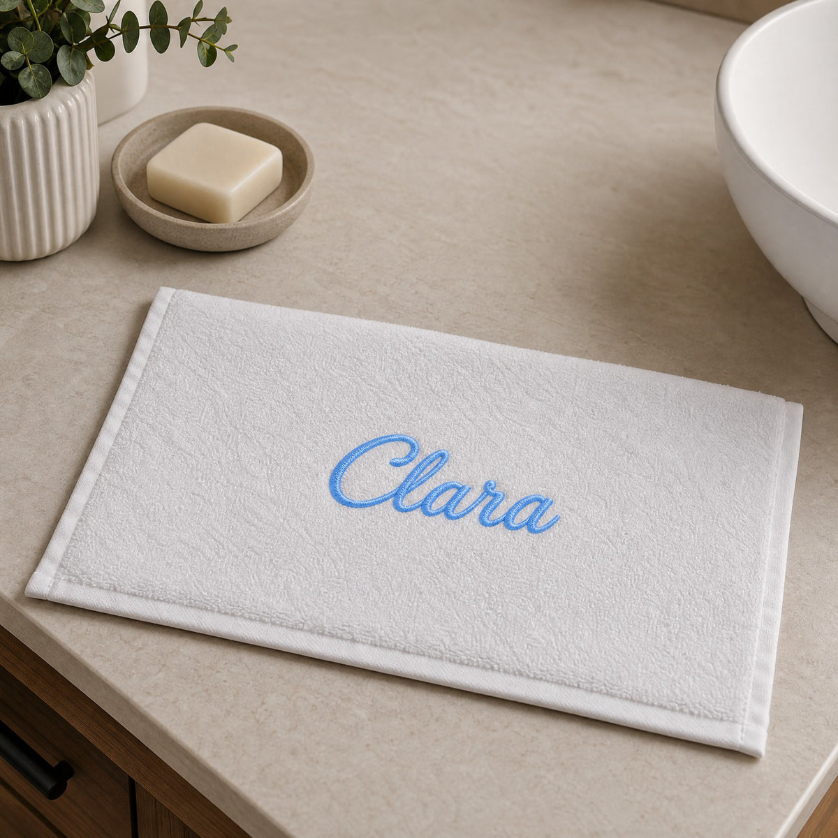 Clara personalized bamboo hand towel, sky blue script embroidery on white — photo 6