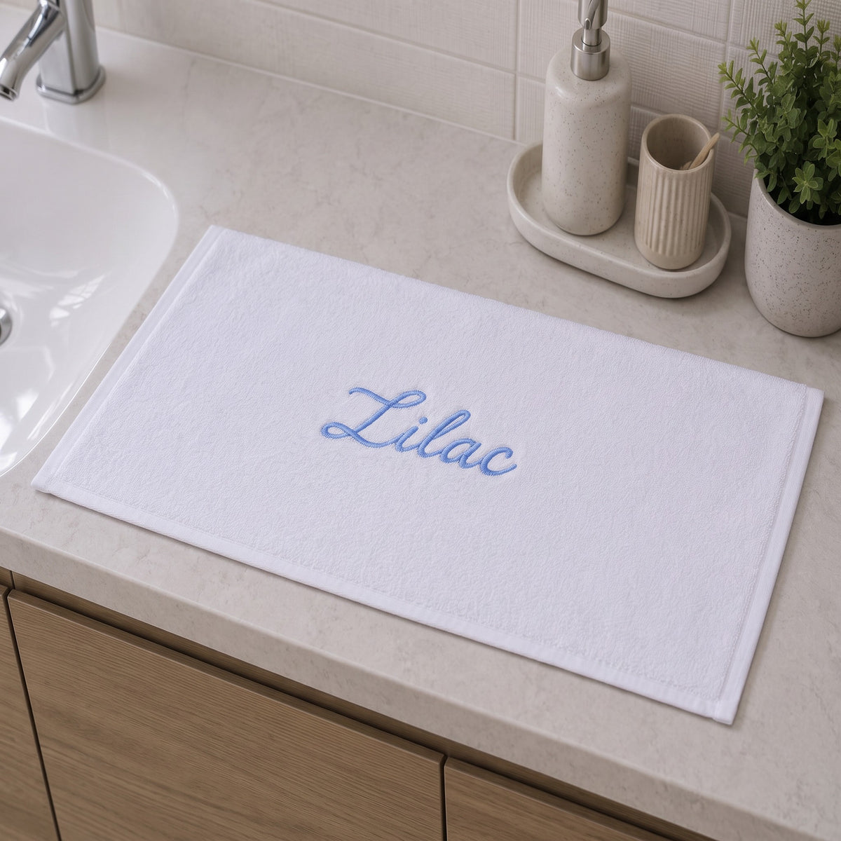 Lilac personalized bamboo hand towel, sky blue script embroidery on white — photo 10