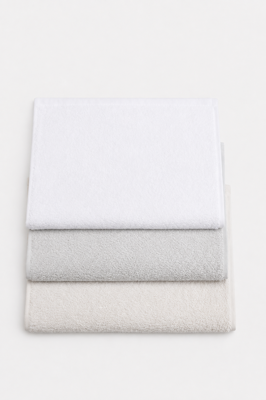 Plain bamboo hand towels in white, light gray and ivory