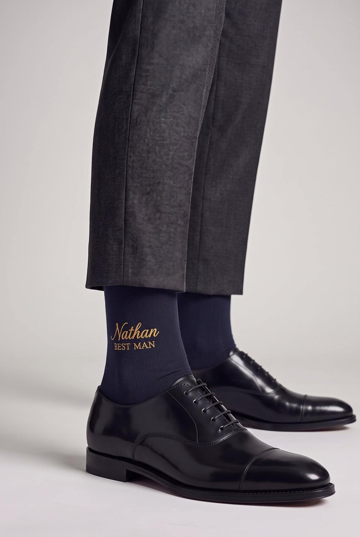 Navy personalized embroidered plain dress socks, worn, second angle — made to order