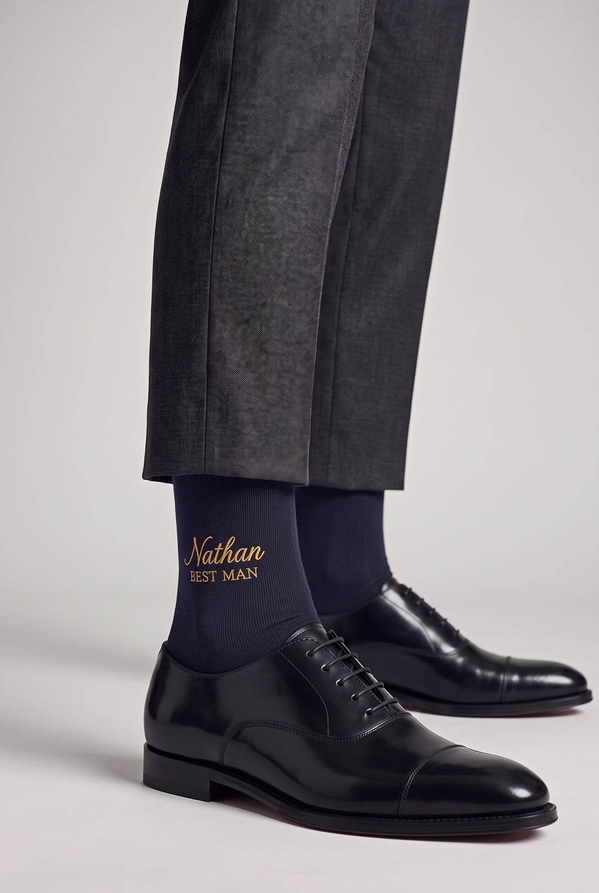 Navy personalized embroidered plain dress socks, worn, second angle — made to order