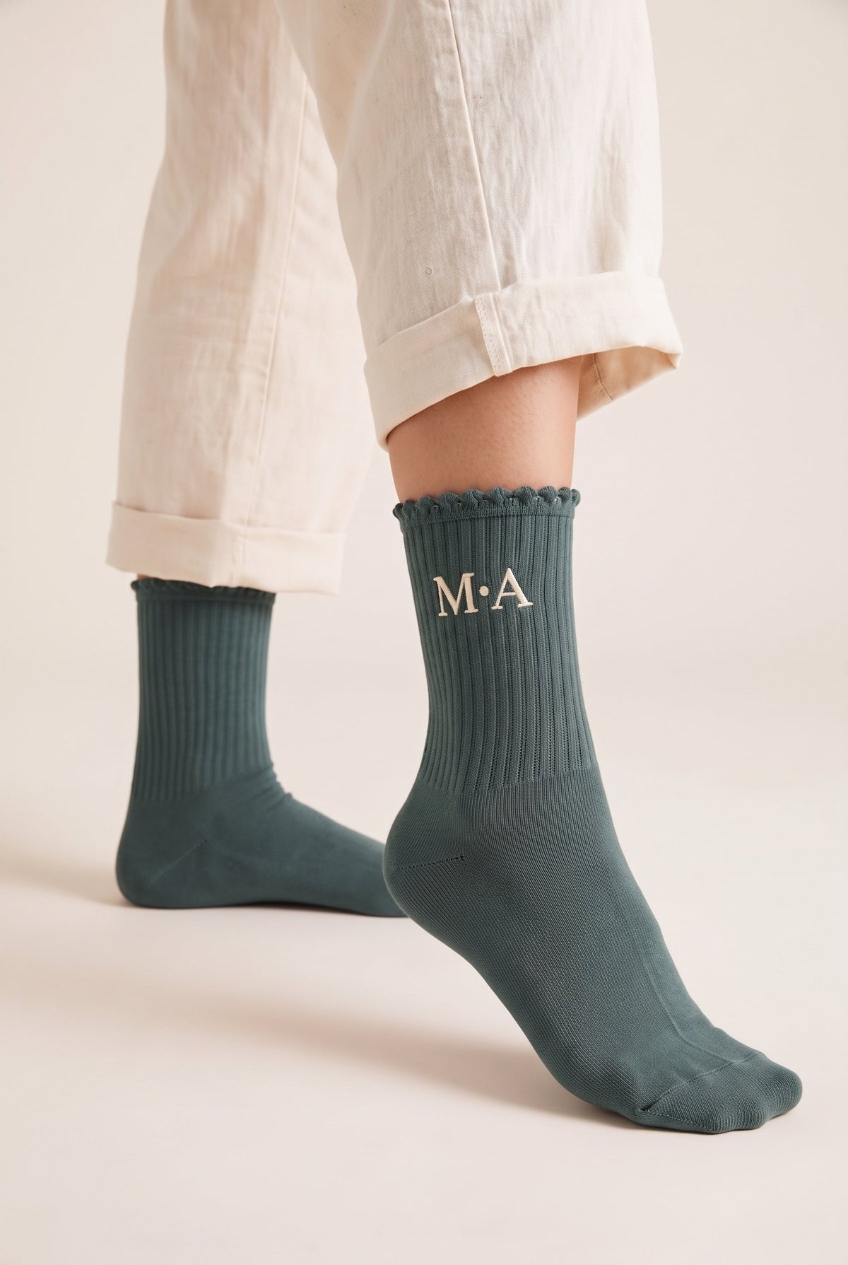 Dark Green personalized embroidered ruffle socks, worn, second angle — made to order