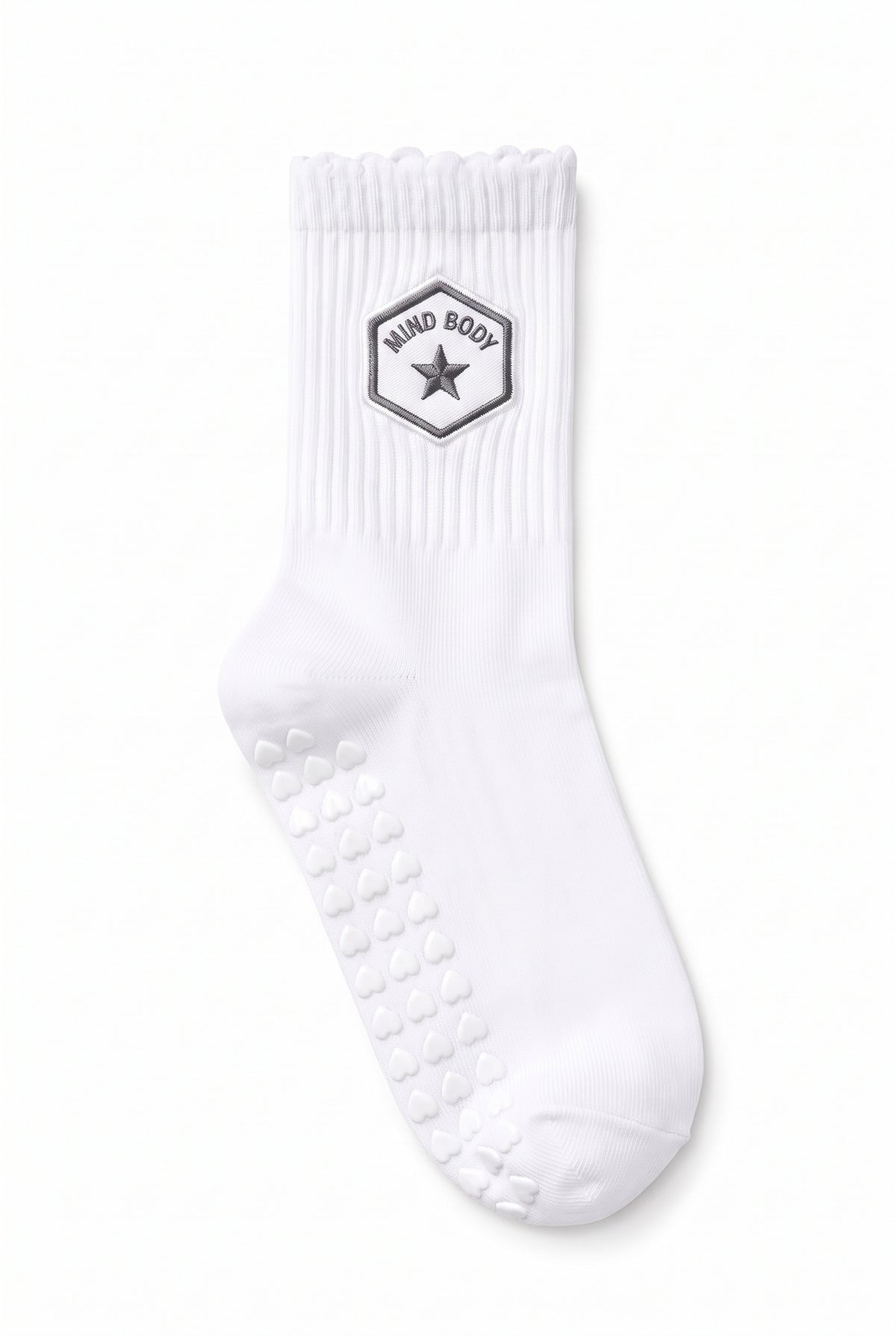 Optical White ruffle pilates grip socks, close-up of the custom embroidery on the ankle — embroidered to order