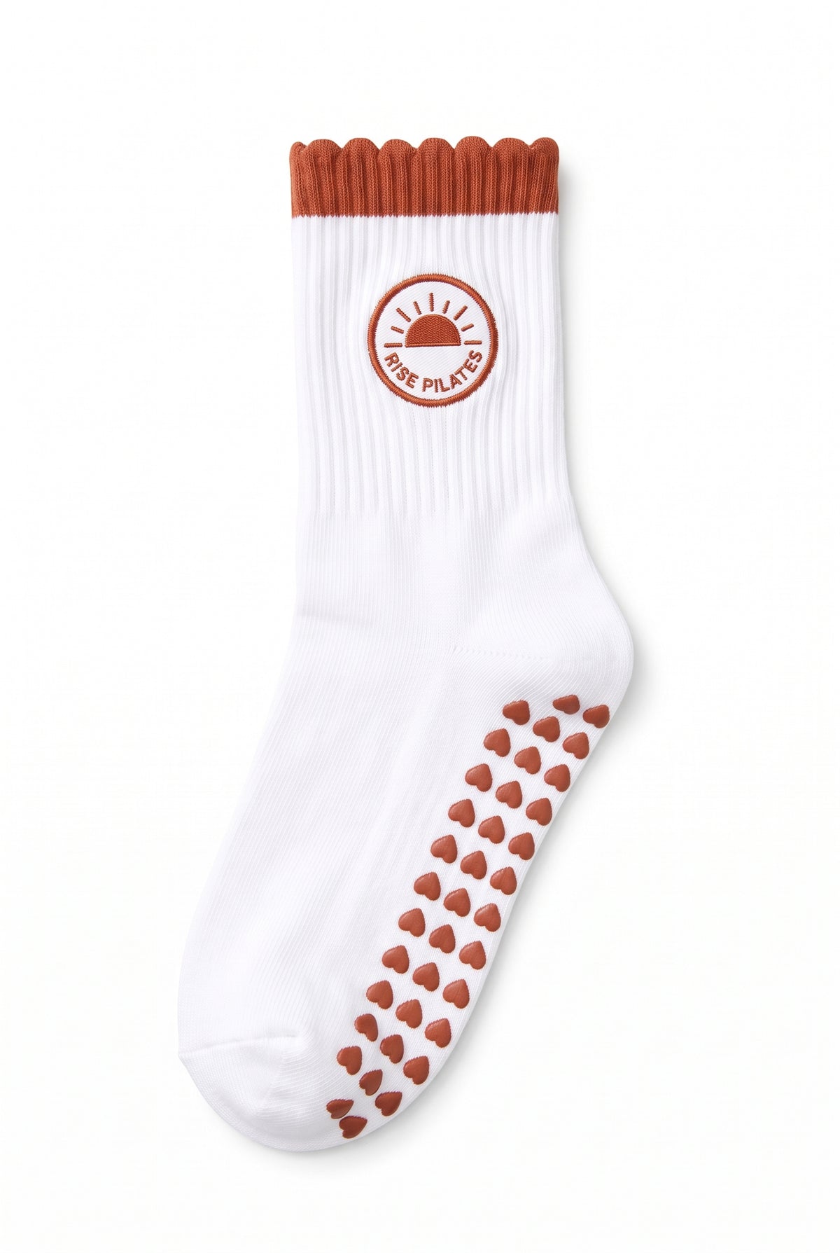 Orange ruffle pilates grip socks, close-up of the custom embroidery on the ankle — embroidered to order
