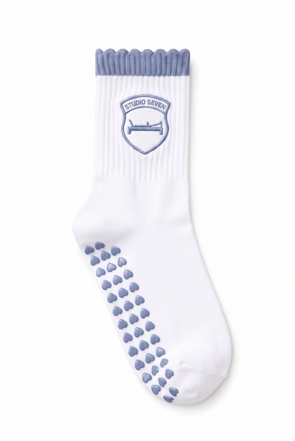 Light Blue ruffle pilates grip socks, close-up of the custom embroidery on the ankle — embroidered to order