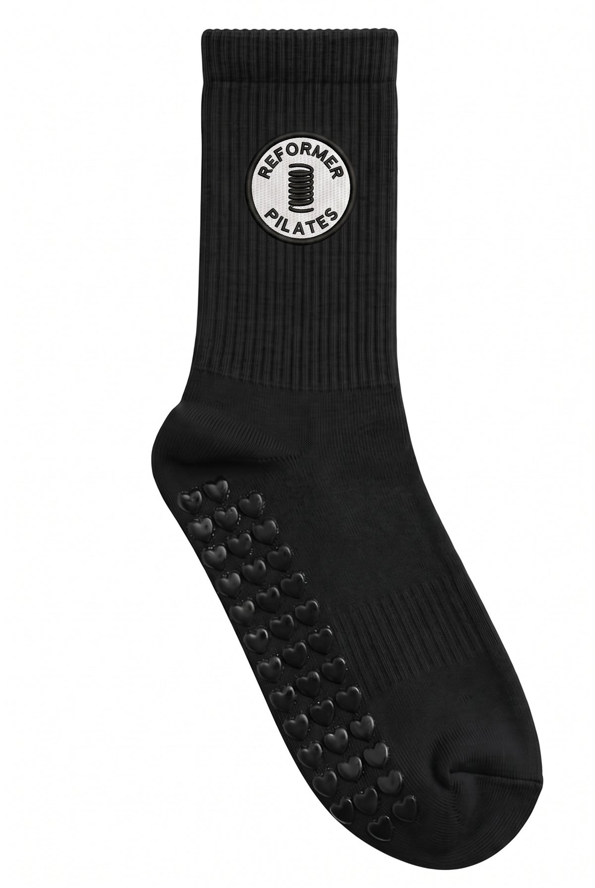 Black pilates grip socks, close-up of the custom embroidery on the ankle — embroidered to order