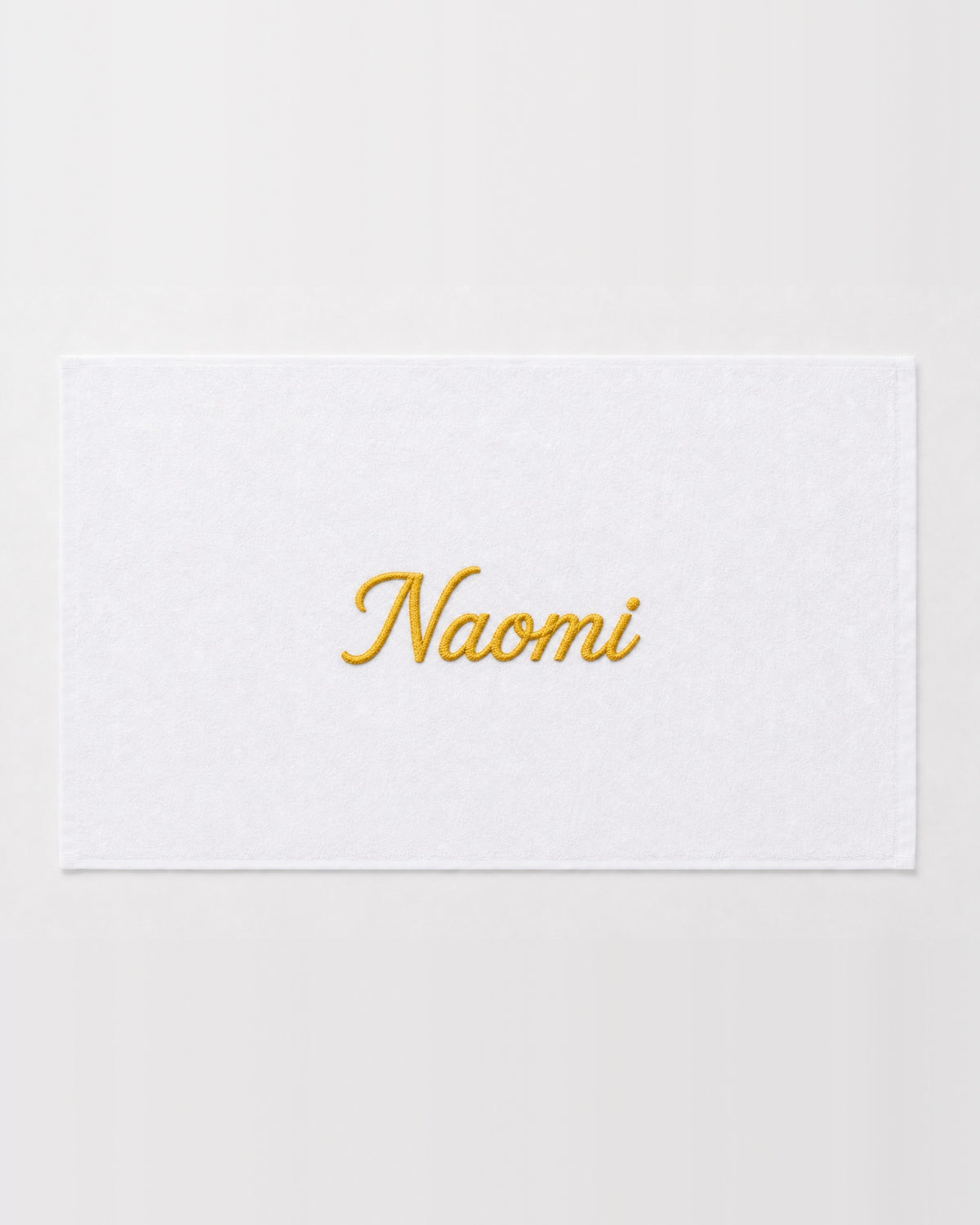 Naomi personalized bamboo hand towel, gold script embroidery on white