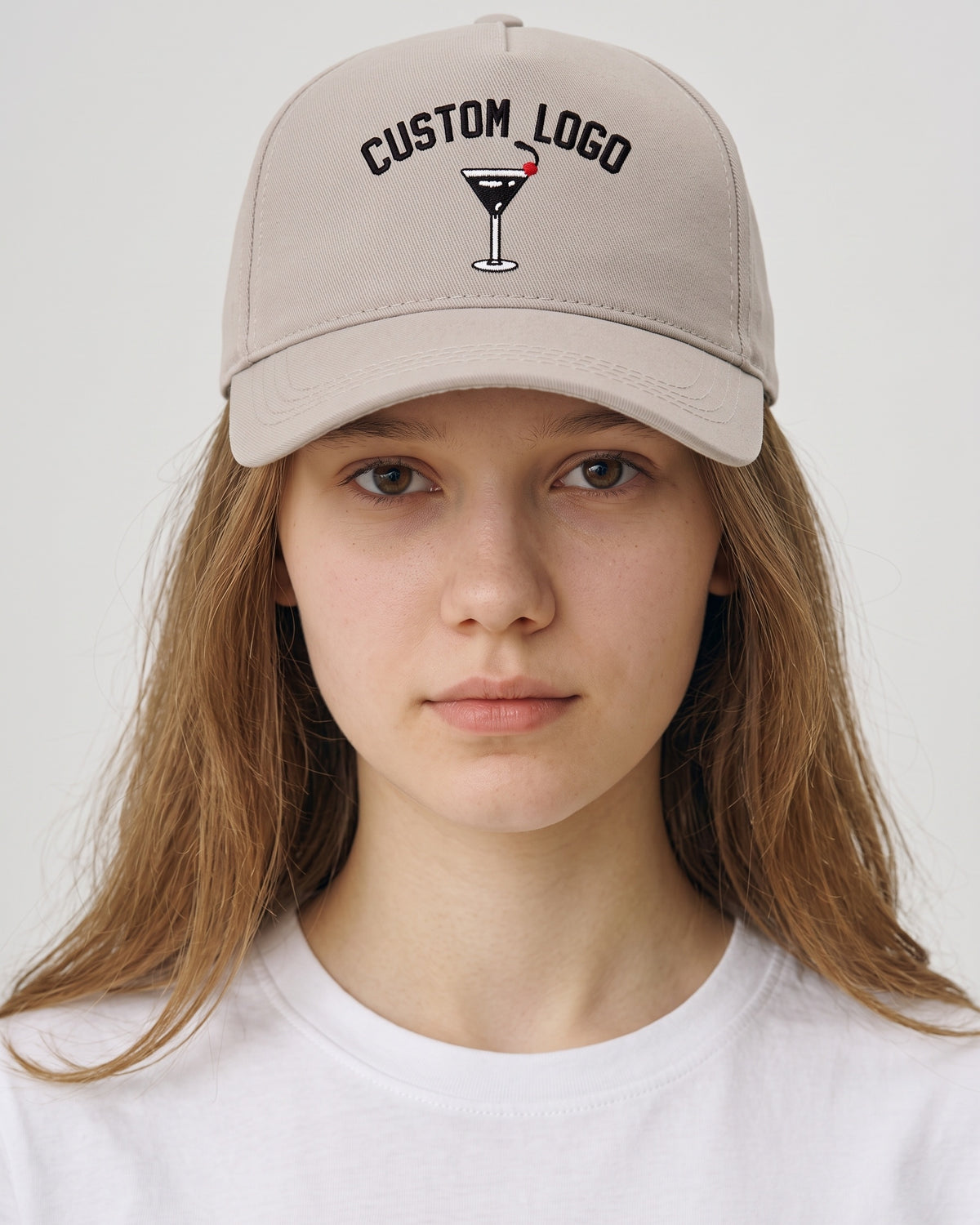 Custom Logo Embroidered Hat worn by a model, front view
