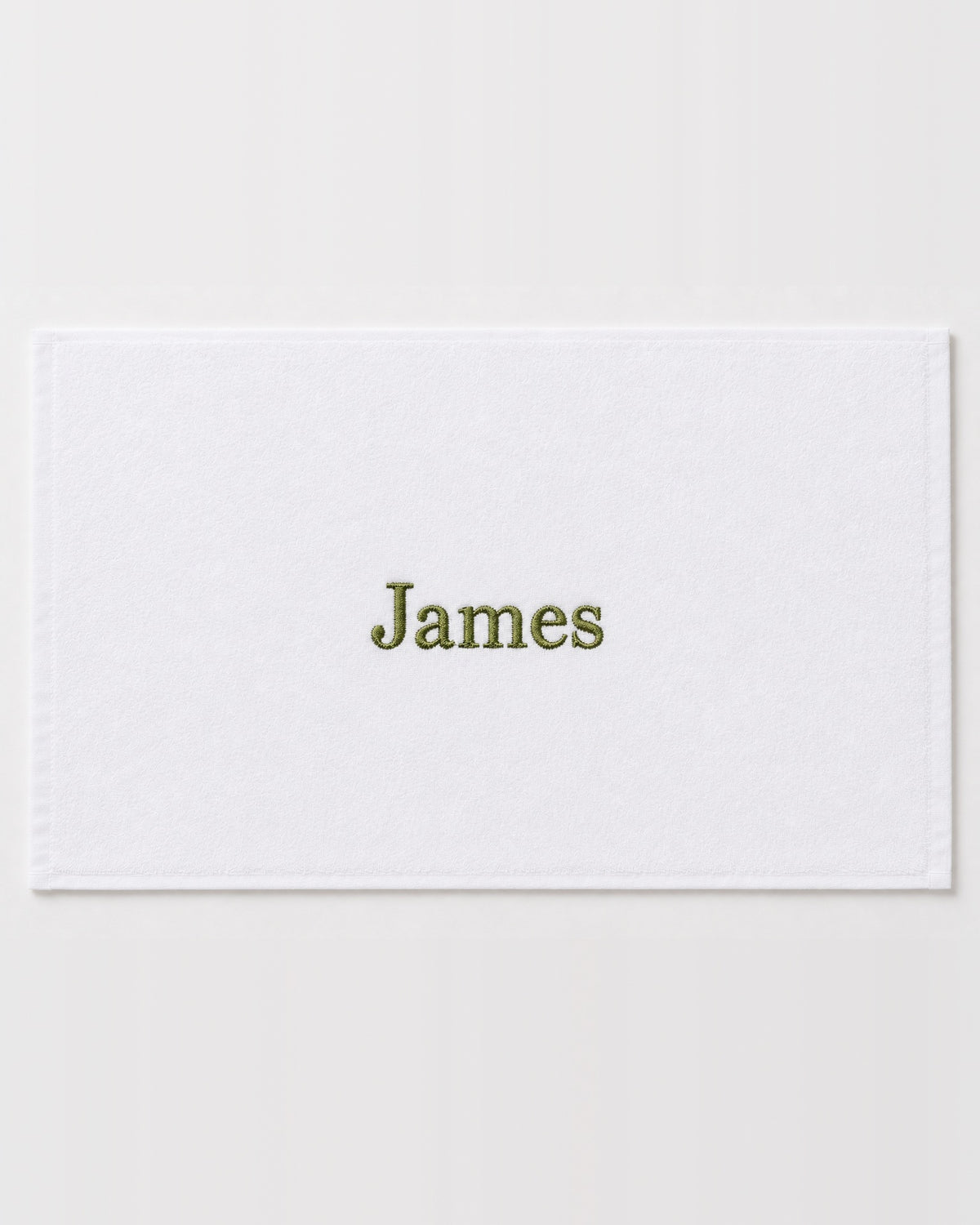 James personalized bamboo hand towel, olive green serif embroidery on white